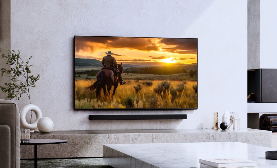 A Sony Bravia 9 TV with a striking image of a person on a horse with the sun on the horizon.