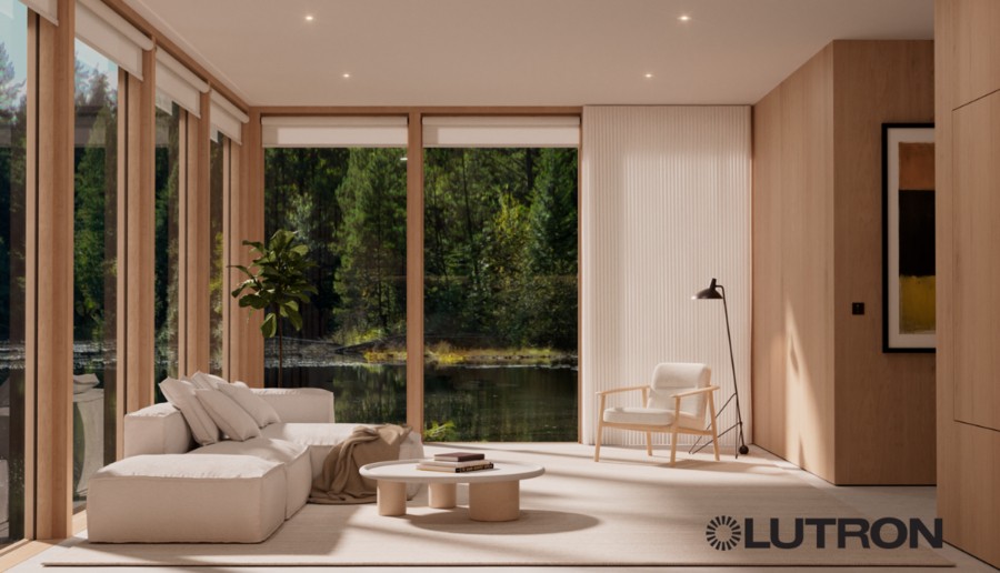 A living space with Lutron recessed draperies partially covering floor-to-ceiling windows.